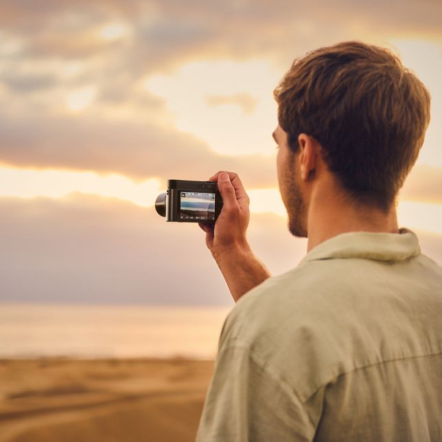 LUMIX camera capturing sunset scene