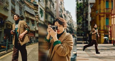 Photographer moving through the streets with the premium compact camera LUMIX L10 (DC-L10)